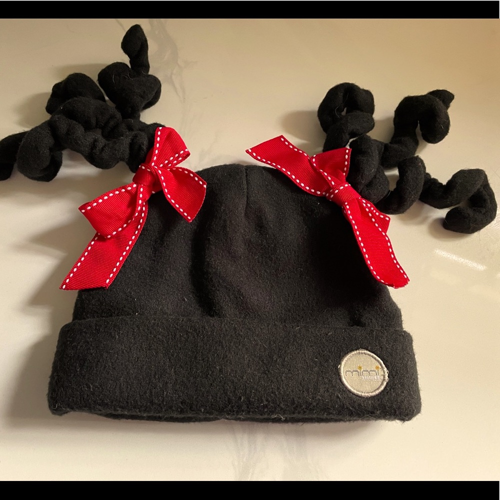 Mimi Couture Baby/Kids snow hat.  Black with red bows.  Extremely warm.